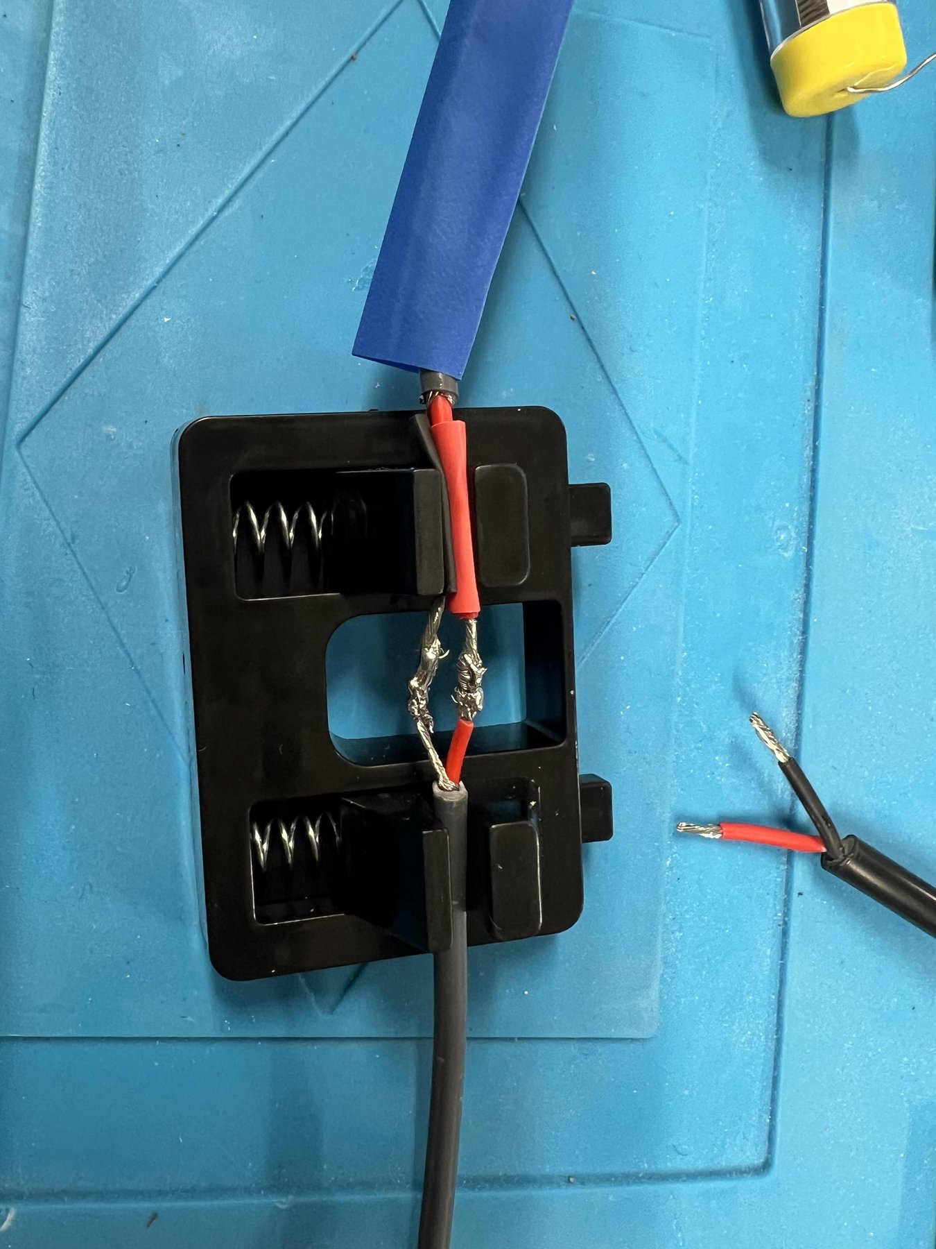 The soldered conductors before the larger outer heat-shrink layer was applied
