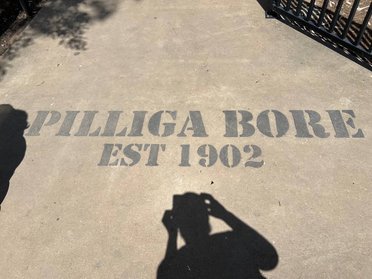 PILLIGA BORE EST 1902 stencilled on the concrete path at the entrance