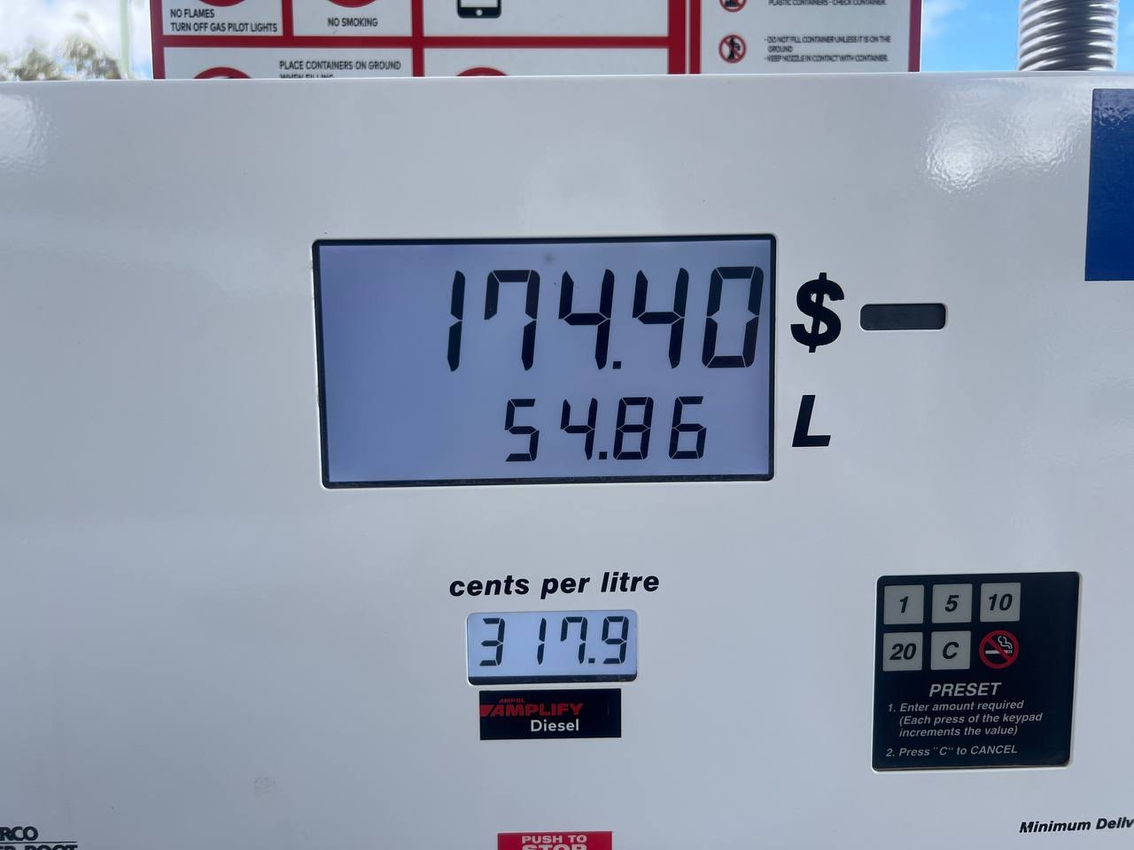 Fuel pump showing $174.40 for 54.86 litres of diesel at 317.9 cents per litre